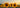 A vibrant sunflower field glowing under warm golden sunset light