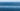 Calm blue ocean stretching to the horizon under a clear sky